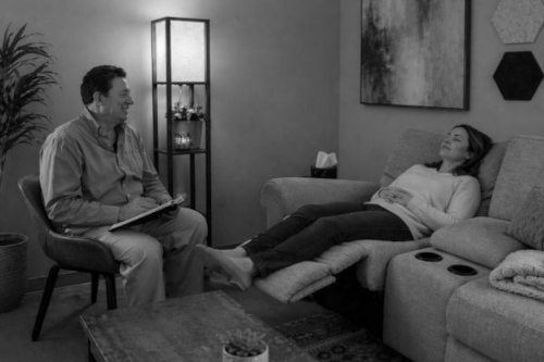 Paul with female client.